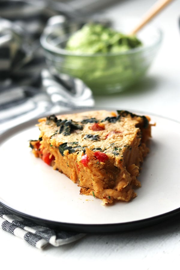 a slice of chickpea pie on a plate.