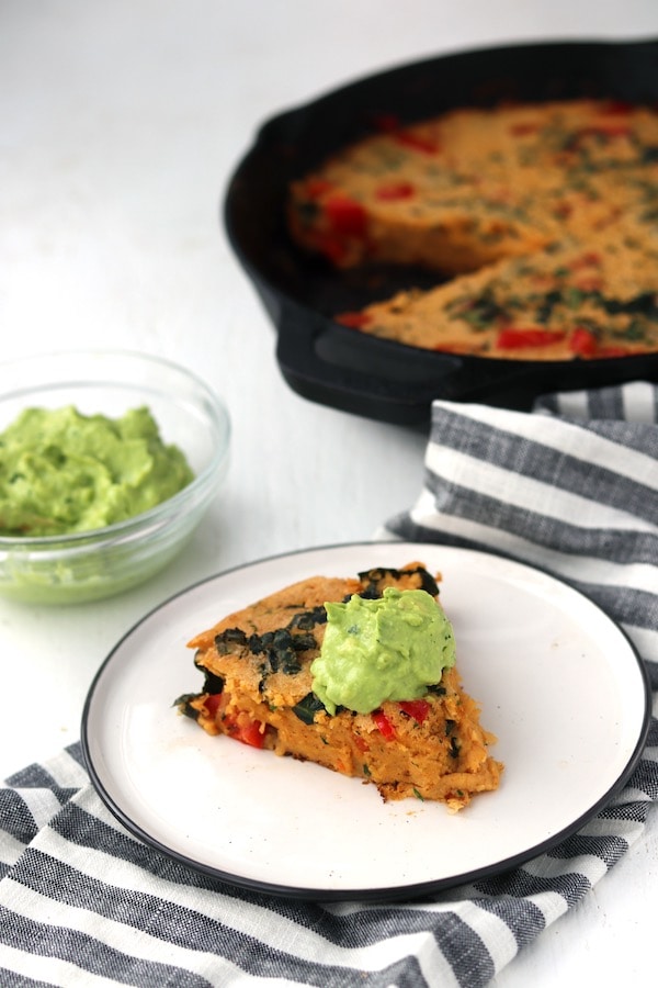 avocado mousse on top of a chickpea bake.