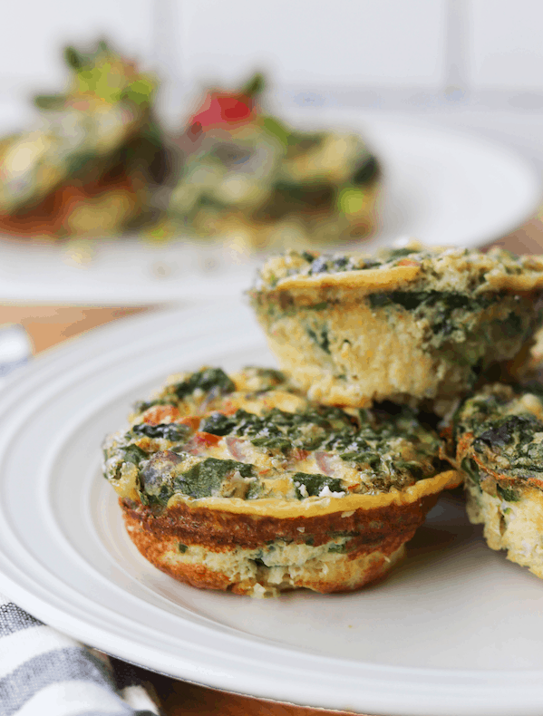 These Mediterranean egg bites are the perfect food to start off your day. With under 100 calories and 7 grams of protein, these bites are a nutrient powerhouse and will keep you feeling full until lunch | Mealswithmaggie.com