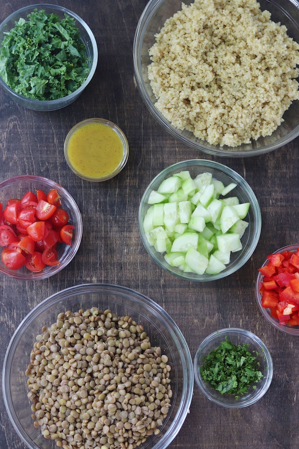 This quinoa lentil salad is a summery blend of fresh vegetables, lentils and cilantro. It is vegan, vegetarian and gluten free! Great for meal prep. #vegan #Vegetarian #glutenfree #coldsalad #mealpreplunches #easymealprep | mealswithmaggie.com