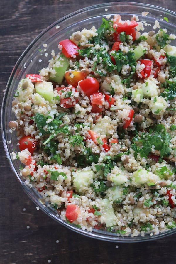 This quinoa lentil salad is a summery blend of fresh vegetables, lentils and cilantro. It is vegan, vegetarian and gluten free! Great for meal prep. #vegan #Vegetarian #glutenfree #coldsalad #mealpreplunches #easymealprep | Mealswithmaggie.com