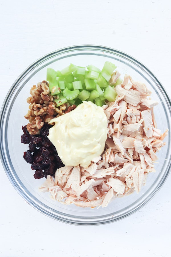 Ingredients for chicken salad in a bowl. 